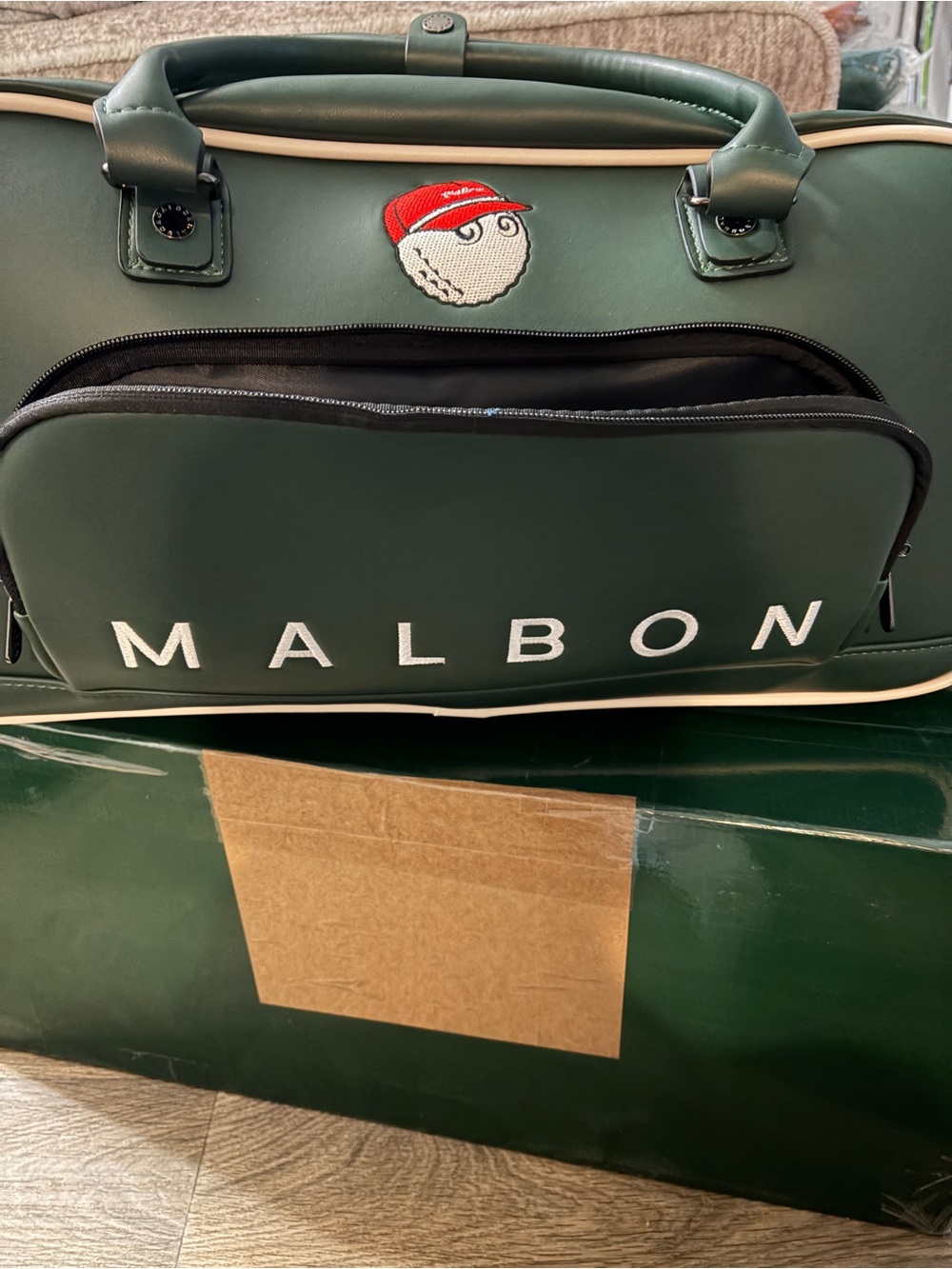MALBON Boston Luggage bag w/ retractable handle. And separate shoe compartment.